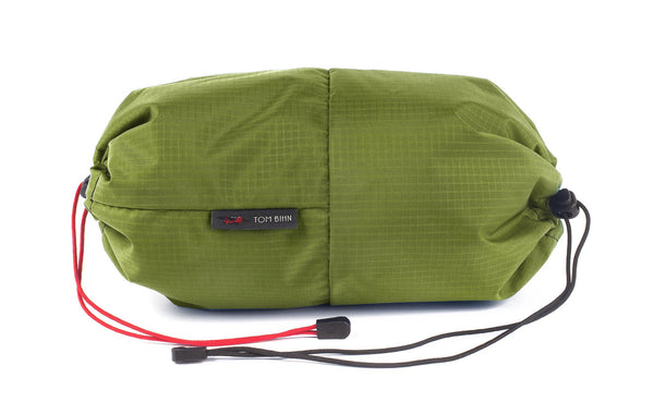 An Aeronaut 45 Travel Laundry Stuff Sack in Moss (green with light blue grid) 210 Cerylon.